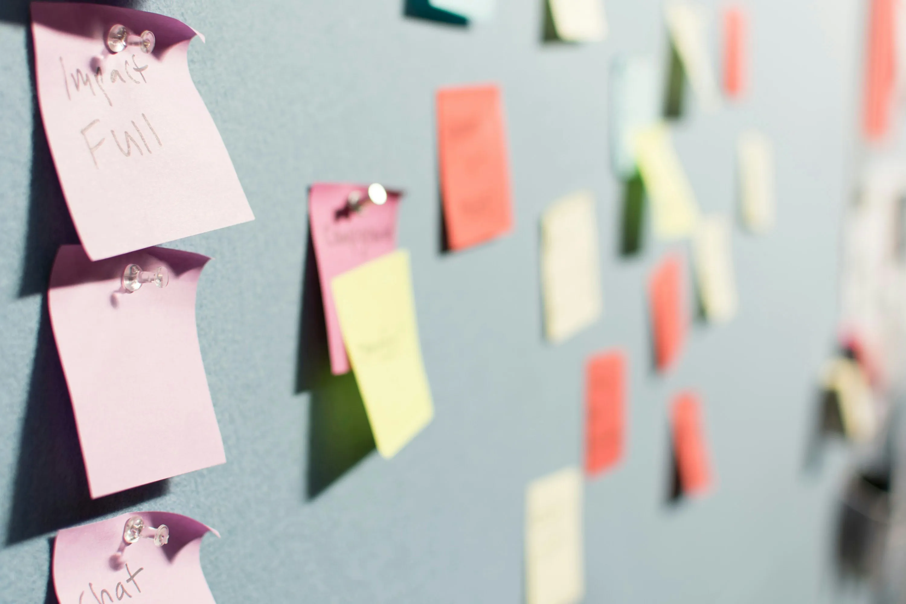 Colorful sticky notes on a board representing product planning and strategy